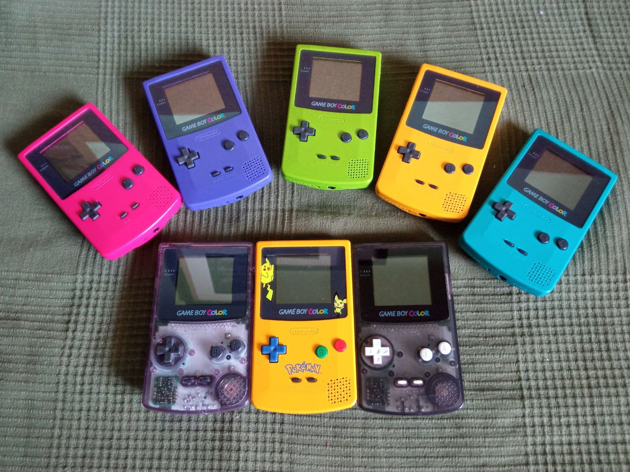 Collection of Game Boy Color consoles in different coolors