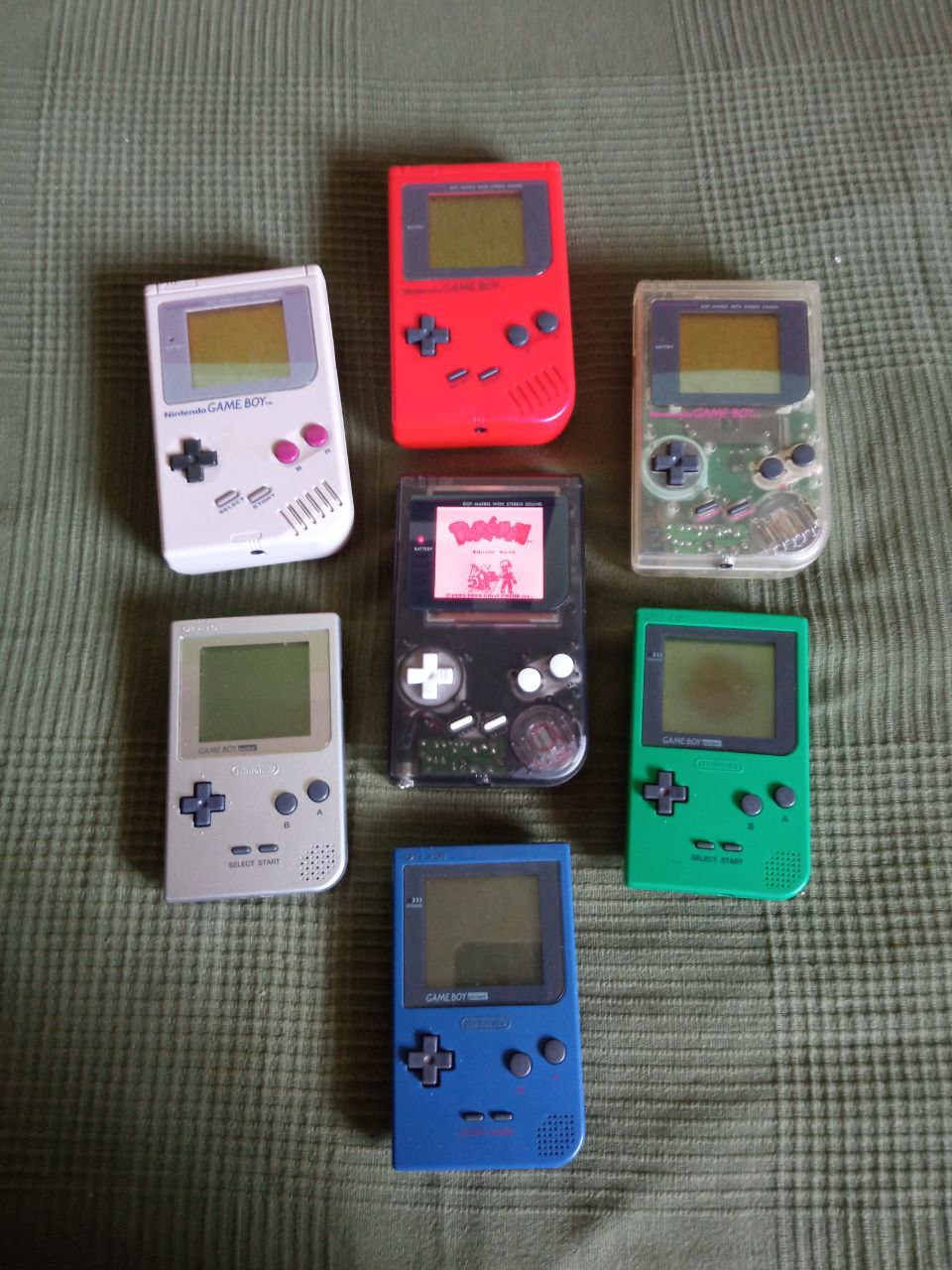 Collection of original Game Boys: four Game Boy DMG and three Game Boy Pocket